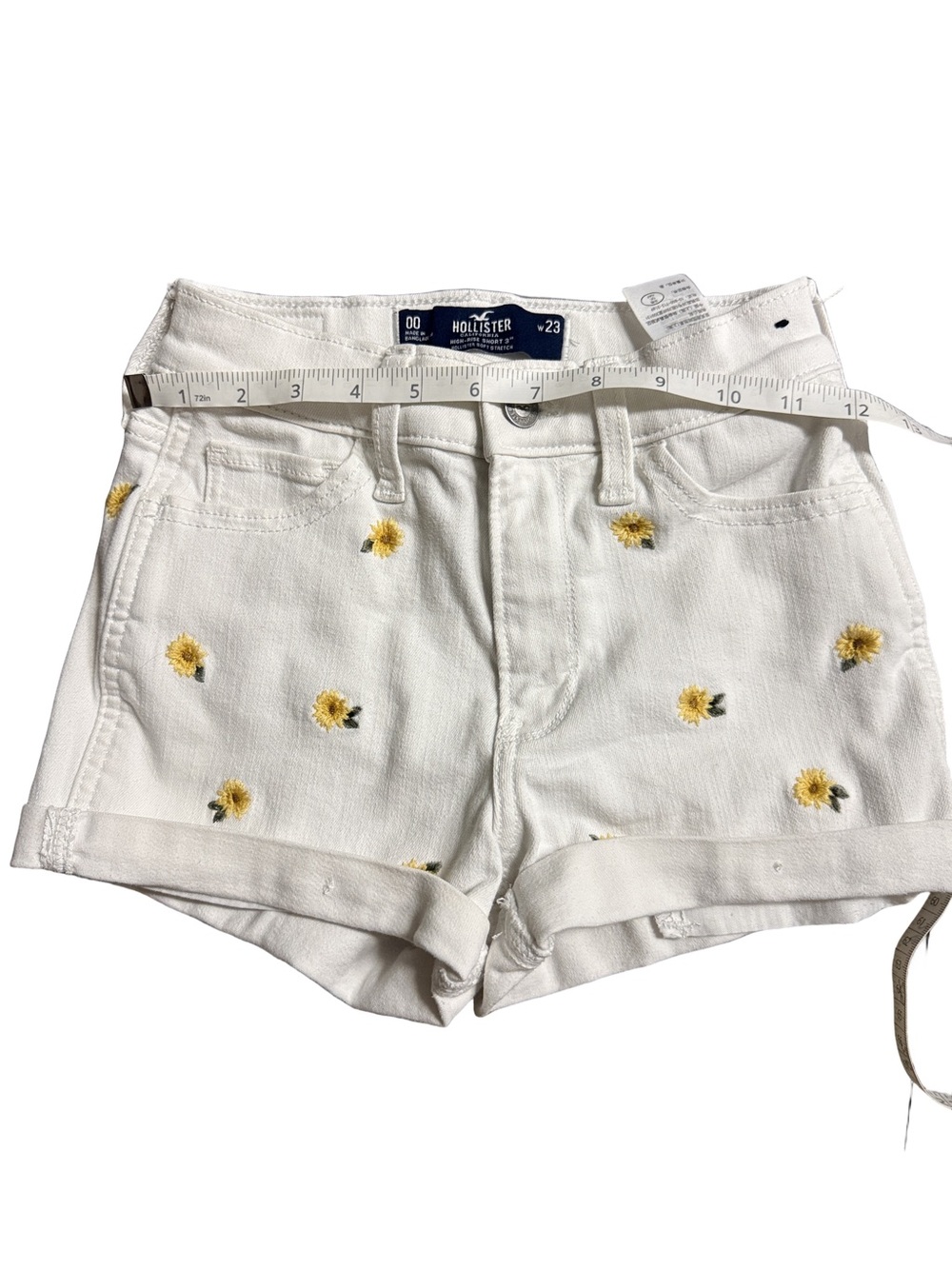 Hollister White Denim Shorts with Yellow Embroidered Flowers